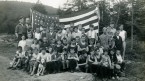 ldbc campers with large American flag.